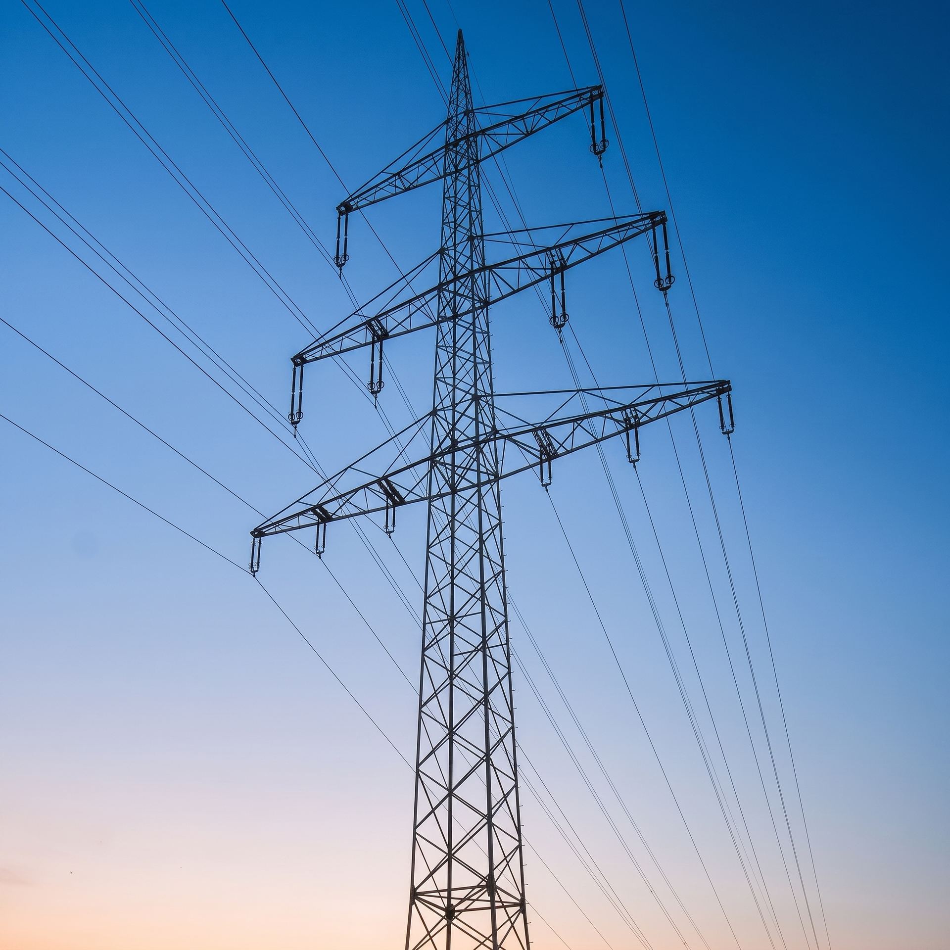 High voltage transmission line at dusk